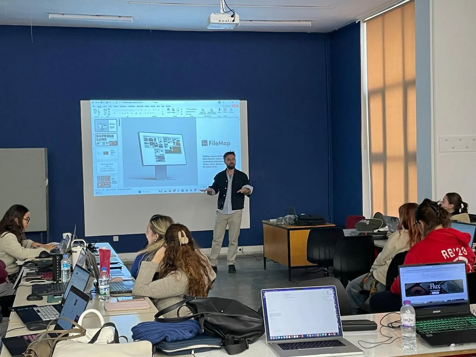 Teaching FileMap in a design classroom, the interface projected on the wall while students follow on laptops